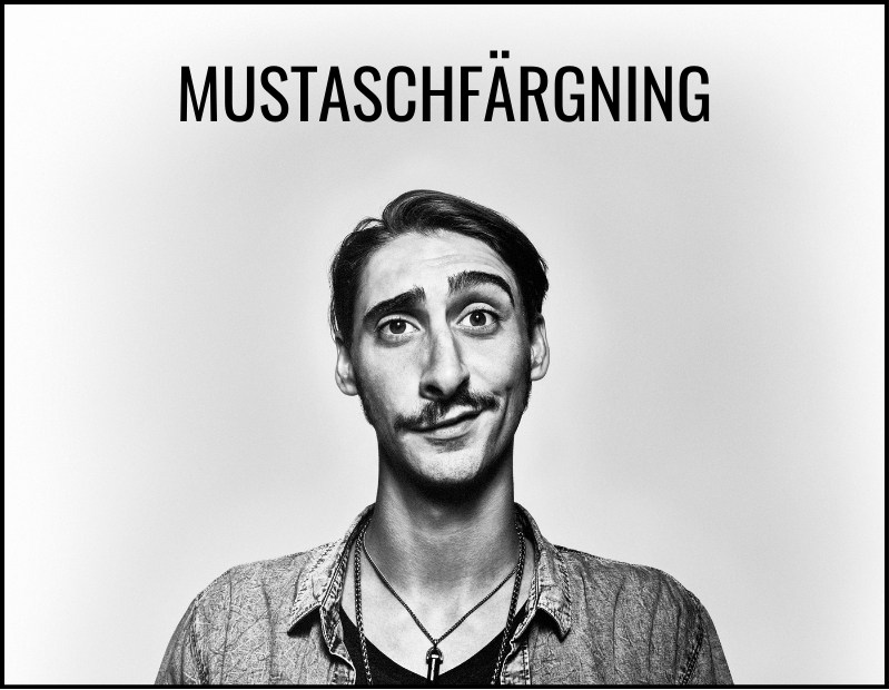 man med färgad mustasch